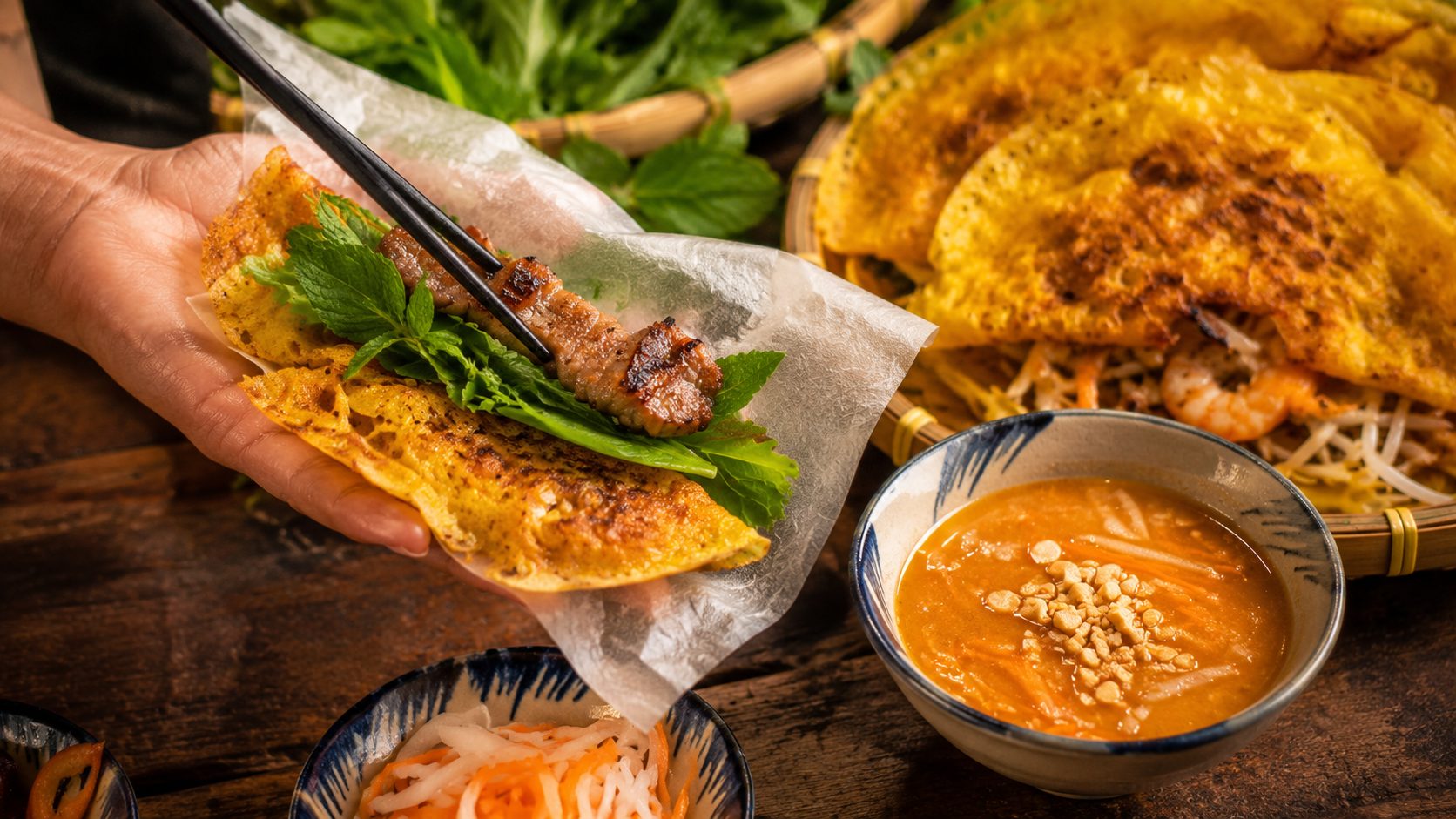 Rolling your own Banh Xeo is an interactive and unforgettable culinary ritual.
