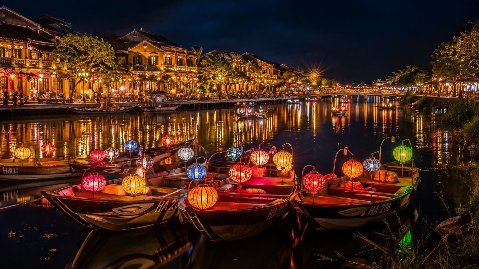 Floating paper lanterns on the river in Hoi An Ancient Town at night.